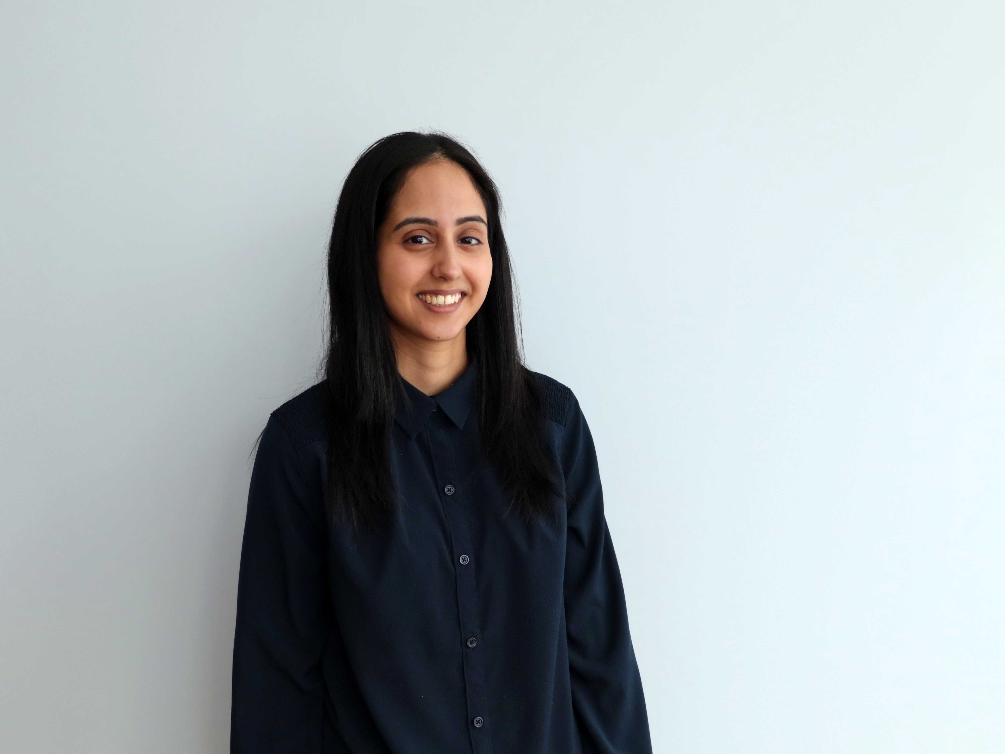 headshot of Harpreet Singh in front of blank wall