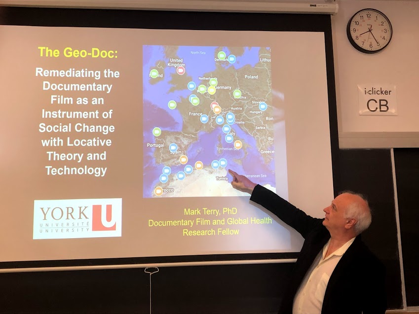 Mark Terry points to a screenshot of his geo-doc project